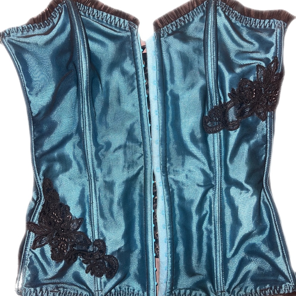 Fredricks of Hollywood corset that Ive only worn a couple of times. Super sexy!